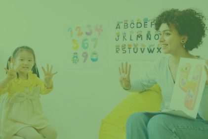 Teacher showing young children how to count.