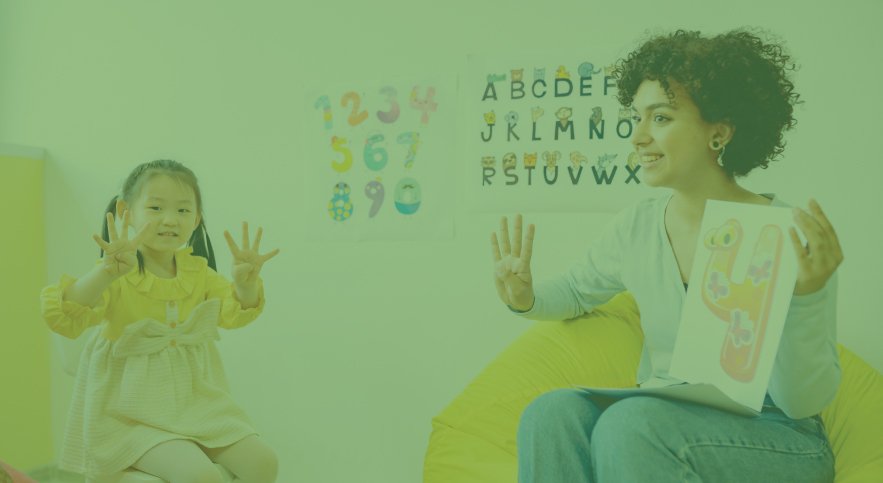 Teacher showing young children how to count.