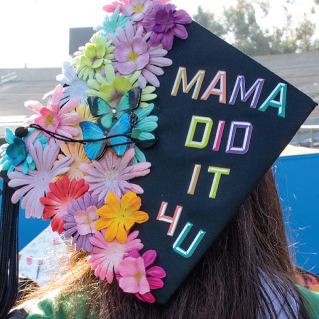 Graduate with cap says Mama did it for you