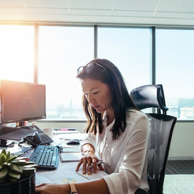 A businesswoman working in finance with her bachelor’s in business administration.
