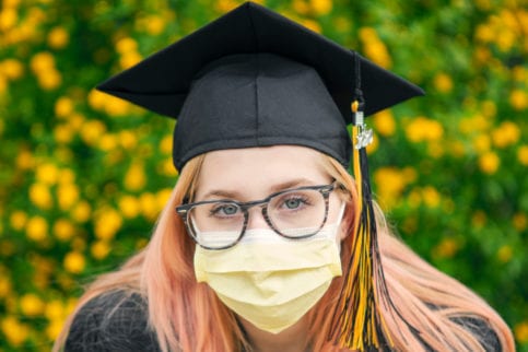 graduate in face mask