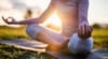 woman doing yoga pose outside
