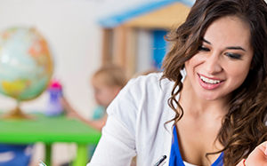 School teacher with child in back