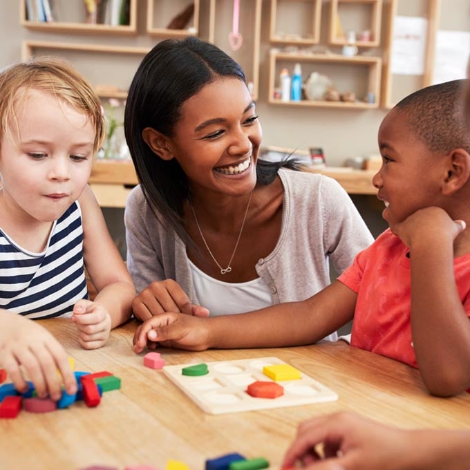 teacher with preschool aged students